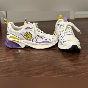 Tory Burch LSU colored shoes.